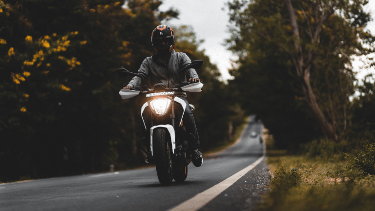Driving motorcycle Image